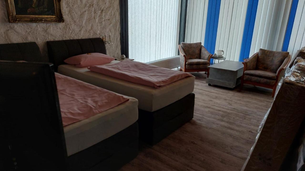 Am Hallenbad Hotel Garni ราทิงเงน ภายนอก รูปภาพ